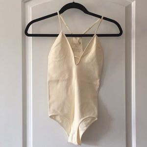 Only worn once eggshell free people bodysuit